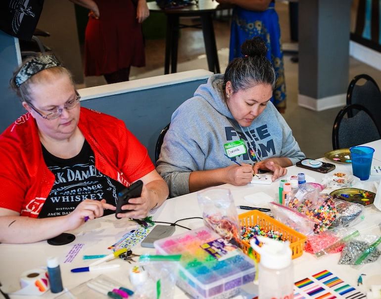 Adults during Craft Night at Clock Inc. LGBT+ Community Center in Rock Island with Free Mom Hugs