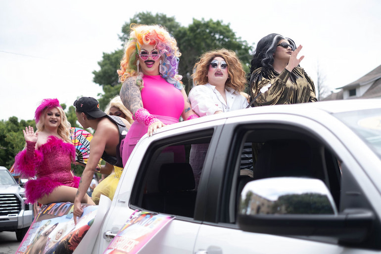 Drag Title-holders in the Iowa City Pride Parade June 15