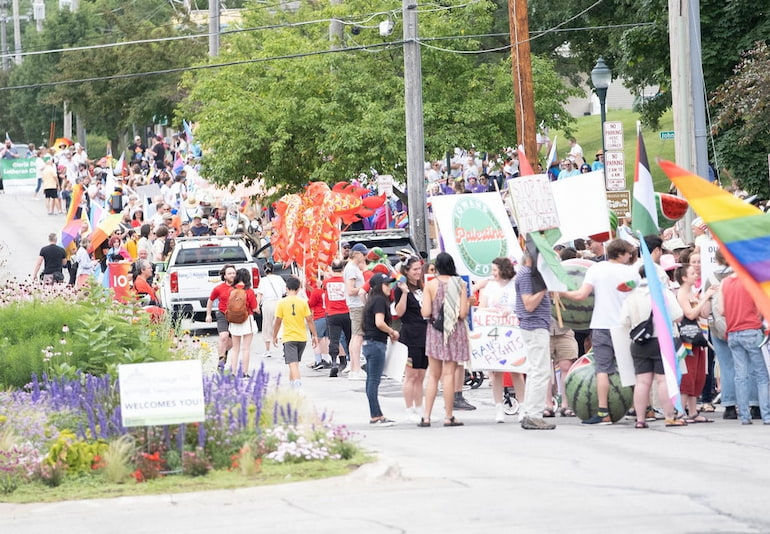 a look at the large crowd lining up to participate in the Iowa City Pride Parade June 15