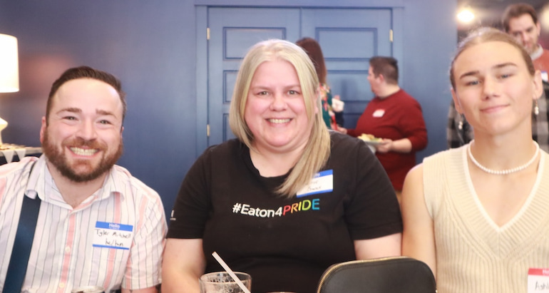 Tyler Mitchell of The Project of the Quad Cities, and Jennifer and Ashley Bowser of Eaton at the Davenport launch