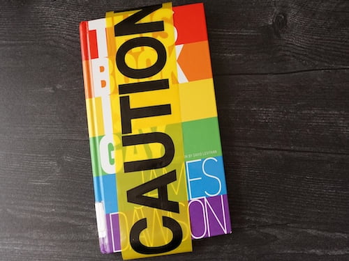 Caution LGBTQ+ book ban